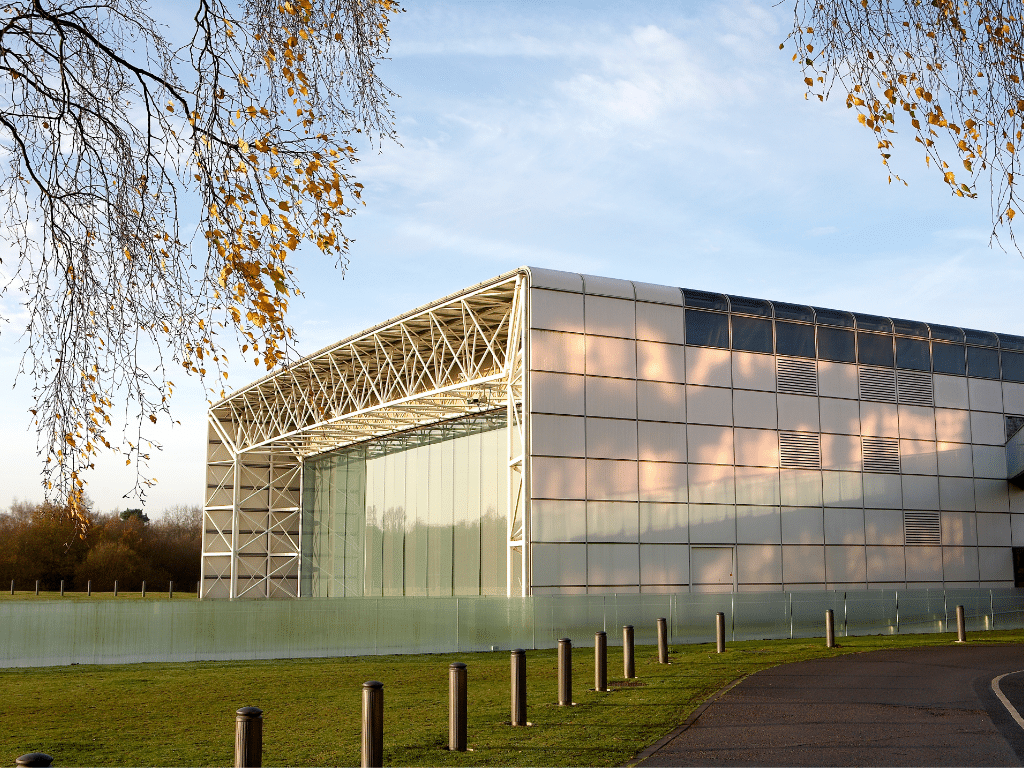 Exterior view of the Sainsbury Centre, showcasing its modern architecture and surrounding environment.
