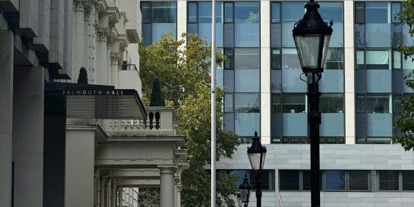 View of Falmouth Hall Street featuring traditional lampposts, buildings, and a clear street scene